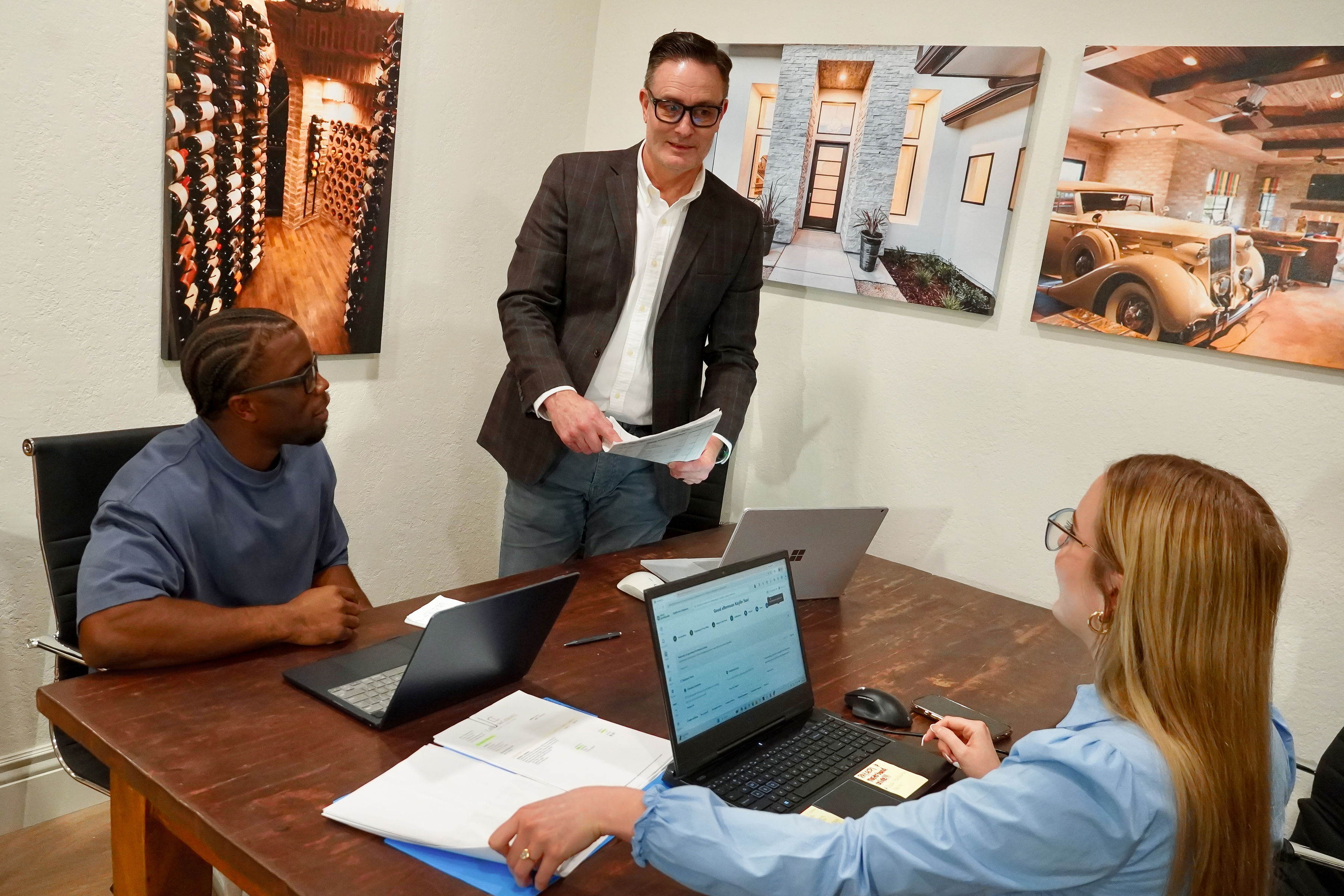 Ken Brown consulting with clients at California Cabinets